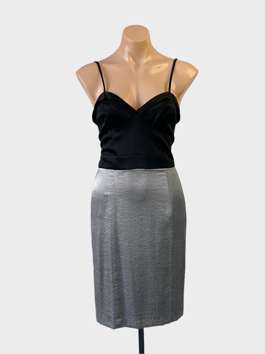 Review sheath dress in black and grey with satin corset bodice and back vent for formal or evening wear.