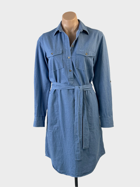 Designer R.M. Williams Western style shirt dress in blue denim with embroidered logo, waist sash and curved hem for weekend or smart casual wear.