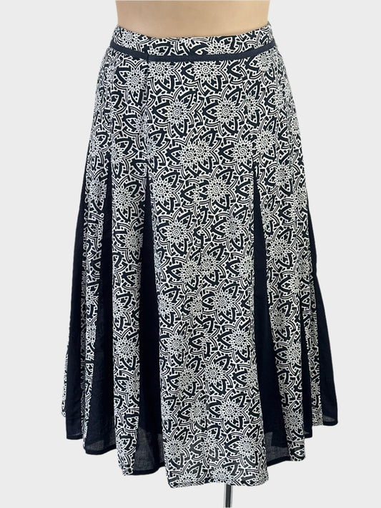 Rodney Clark navy and white godet skirt in pure cotton with Arabesque print, contrasting godet panels and waistband for smart casual or office wear.