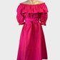 Rodney Clark off the shoulder dress in pink with ruffle neckline and full skirt for formal or special events wear.