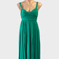 Designer SABA empire waist dress in green with pleated surplice neck and gathered skirt for smart casual or special events wear.