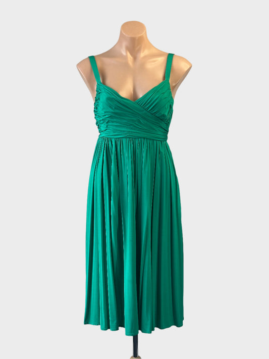 Designer SABA empire waist dress in green with pleated surplice neck and gathered skirt for smart casual or special events wear.
