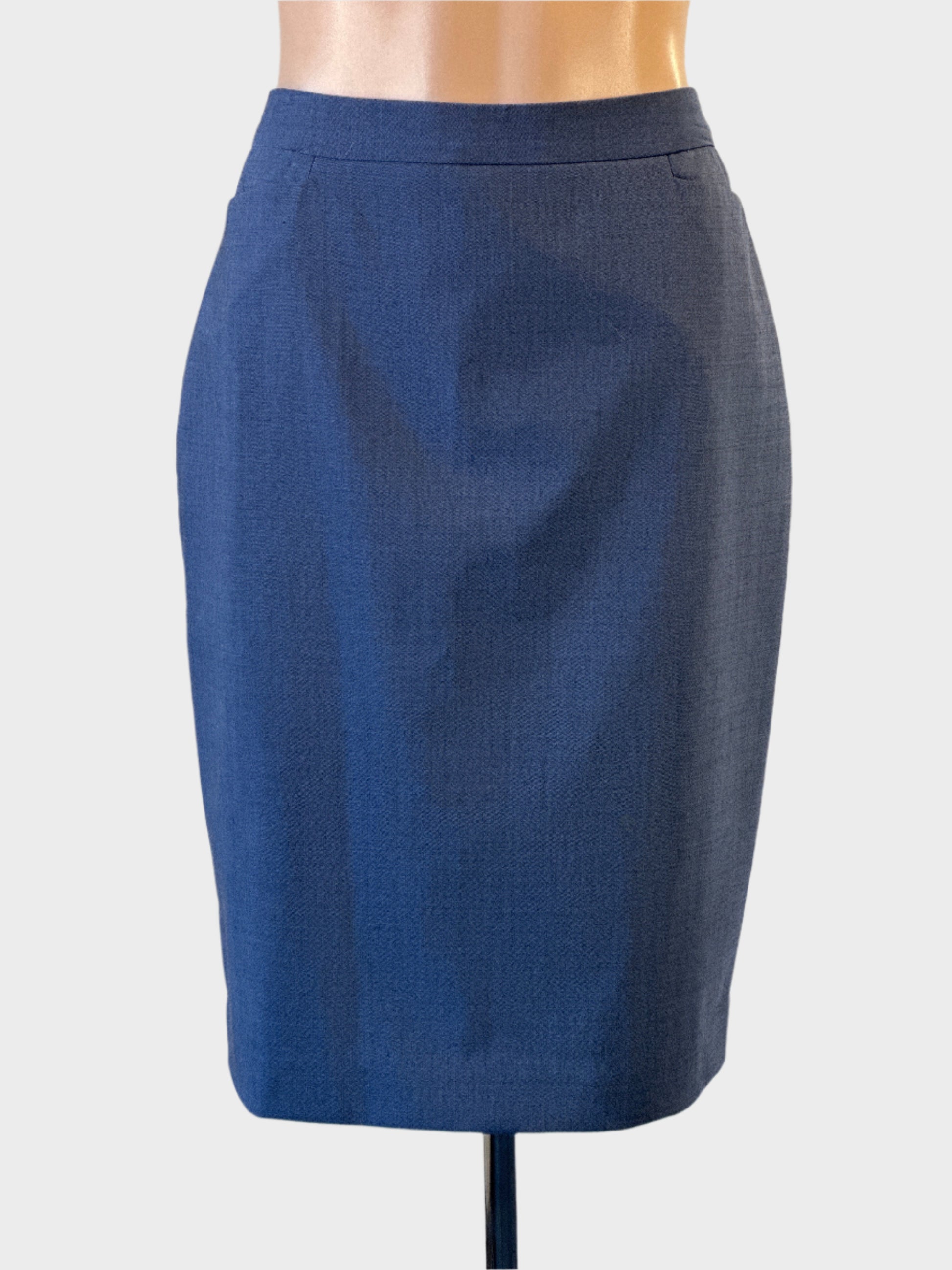 Designer SABA petrol blue straight skirt with angled front pockets and back vent for office wear.