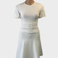 Designer Sandro A-line dress in white with lace up corset belt for sporty luxe or special events wear.
