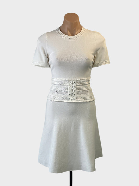Designer Sandro A-line dress in white with lace up corset belt for sporty luxe or special events wear.