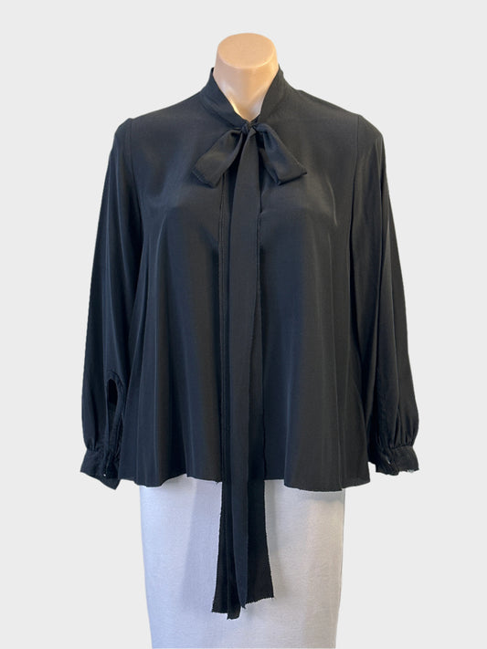 Designer Scanlan Theodore top in black silk with pussy bow and overlock trim for office or evening wear.