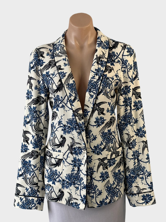 Designer Scotch & Soda single-breasted jacket in blue and white botanical print with shawl lapels, one-button closure and piped trim for office or smart casual wear.