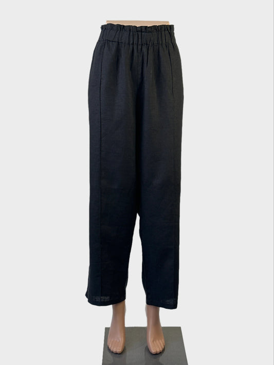 Seed black wide leg pants in linen with high-rise garterised waistband, in-seam pockets, and traveller's crease for smart casual or office wear.