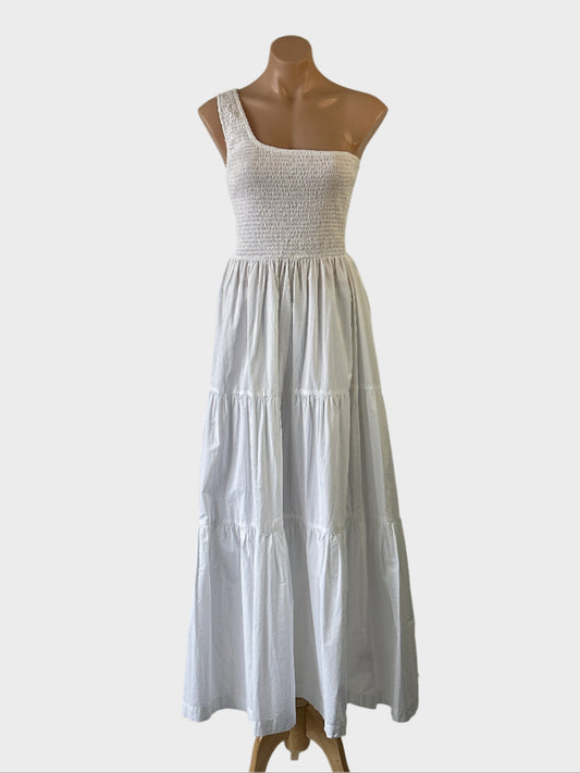 Seed one shoulder maxi dress in white with shirred bodice, asymmetric neck and tiered skirt for smart casual or resort wear.