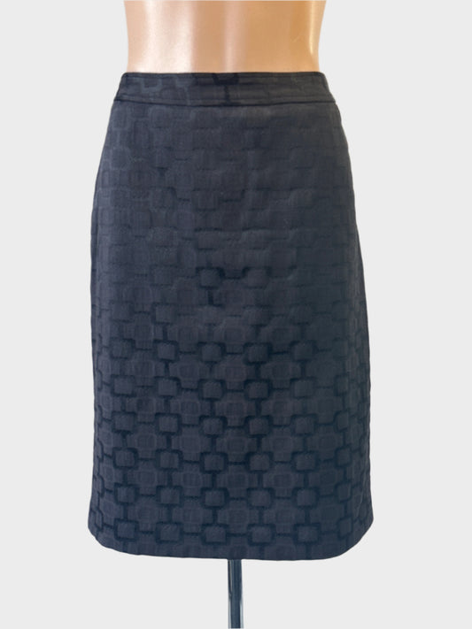 SportEight straight skirt in black geometric jacquard for office wear.