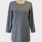 Sussan houndstooth shift dress in grey with round neck and slash pockets for office wear.