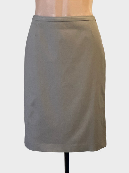 Designer T Tahari straight skirt in beige with back vent for office wear.