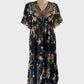 Taking Shape black and yellow blouson dress with leopard and floral patterns and rhinestone v-neck for evening or special events.