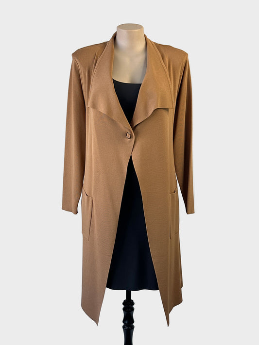 Long line Taking Shape cardigan in camel ribbed knit with wing lapels, patch pockets and tie back sash for office or smart casual wear.