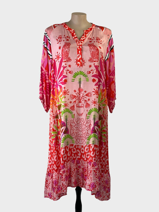 Boho style Taking Shape maxi dress in exotic Eastern print with contrasting animal print back and ruffle hem for resort or smart casual wear.