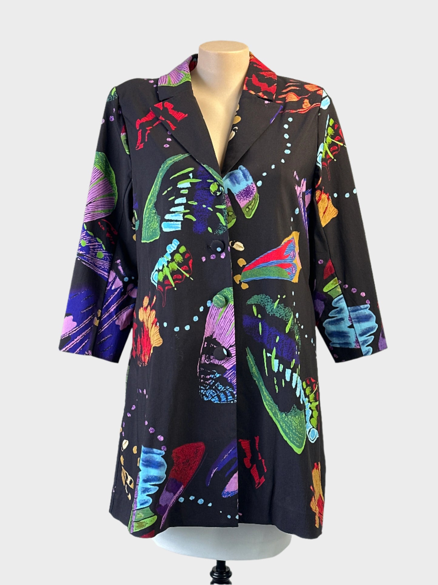Taking Shape multicoloured abstract print coat with notched lapels and in-seam pockets for smart casual or special events.