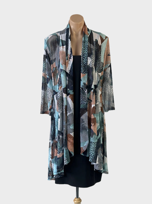 Taking Shape open front jacket in blue geometric print sheer mesh with shawl lapel, long sleeves and high low hem.