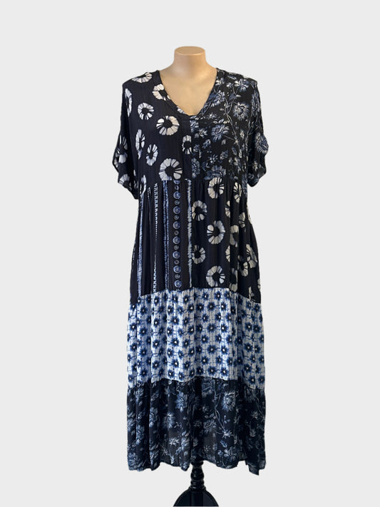 Taking Shape smock dress in brown batik and floral prints for evening or special events.