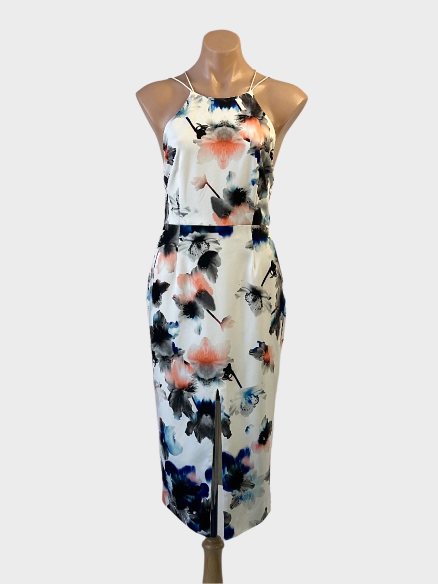 Talulah sheath dress in ivory and orange floral print with halter neck and front slit for formal or special events wear.