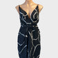 Talulah sleeveless sheath dress in black and grey marbled style print for evening wear.