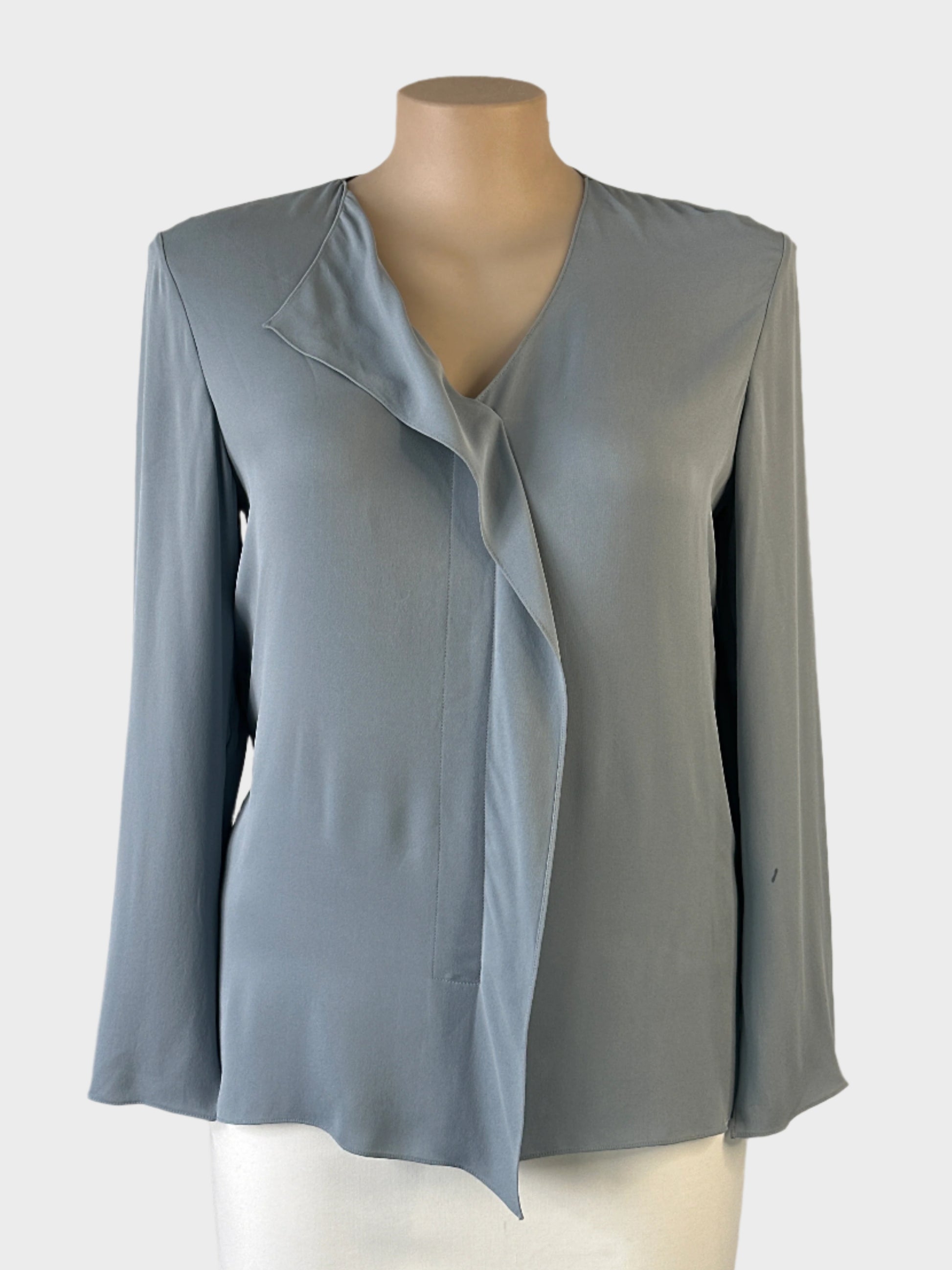 Designer Theory classic top in grey crepe with v-neck flounce, long sleeves and notched hem for office or special events.