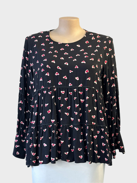 Threadz smock top in black and pink heart print with ric rac trim and high low hem for smart casual wear.