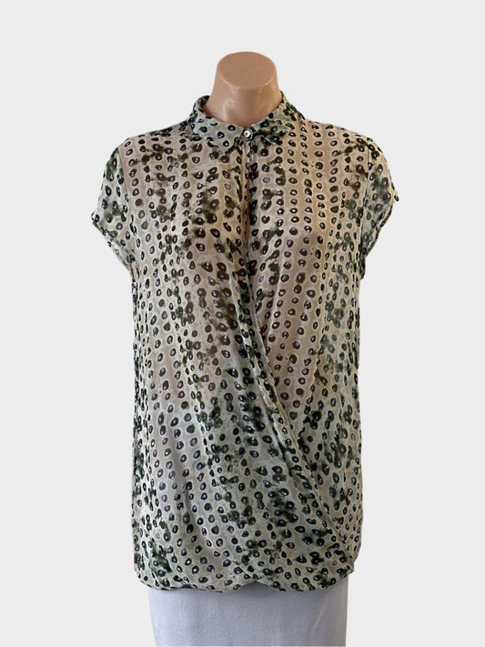 Designer Transit Par Such sheer top in grey dot print with draped front and pleated hip for smart casual wear.