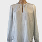 Trenery top in ivory with black polka dots, keyhole neckline and long sleeves for office wear.
