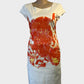 Designer Trent Nathan shift dress in white and orange abstract print with cap sleeves for office or special events wear.