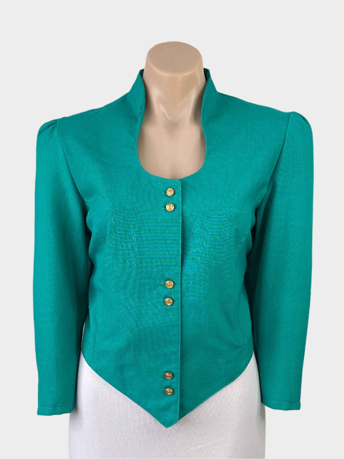 Vintage designer Trish Haines green vintage 80's single breasted cut-away jacket with gold buttons, tear drop neckline and pleated cuffs for special events or office wear.