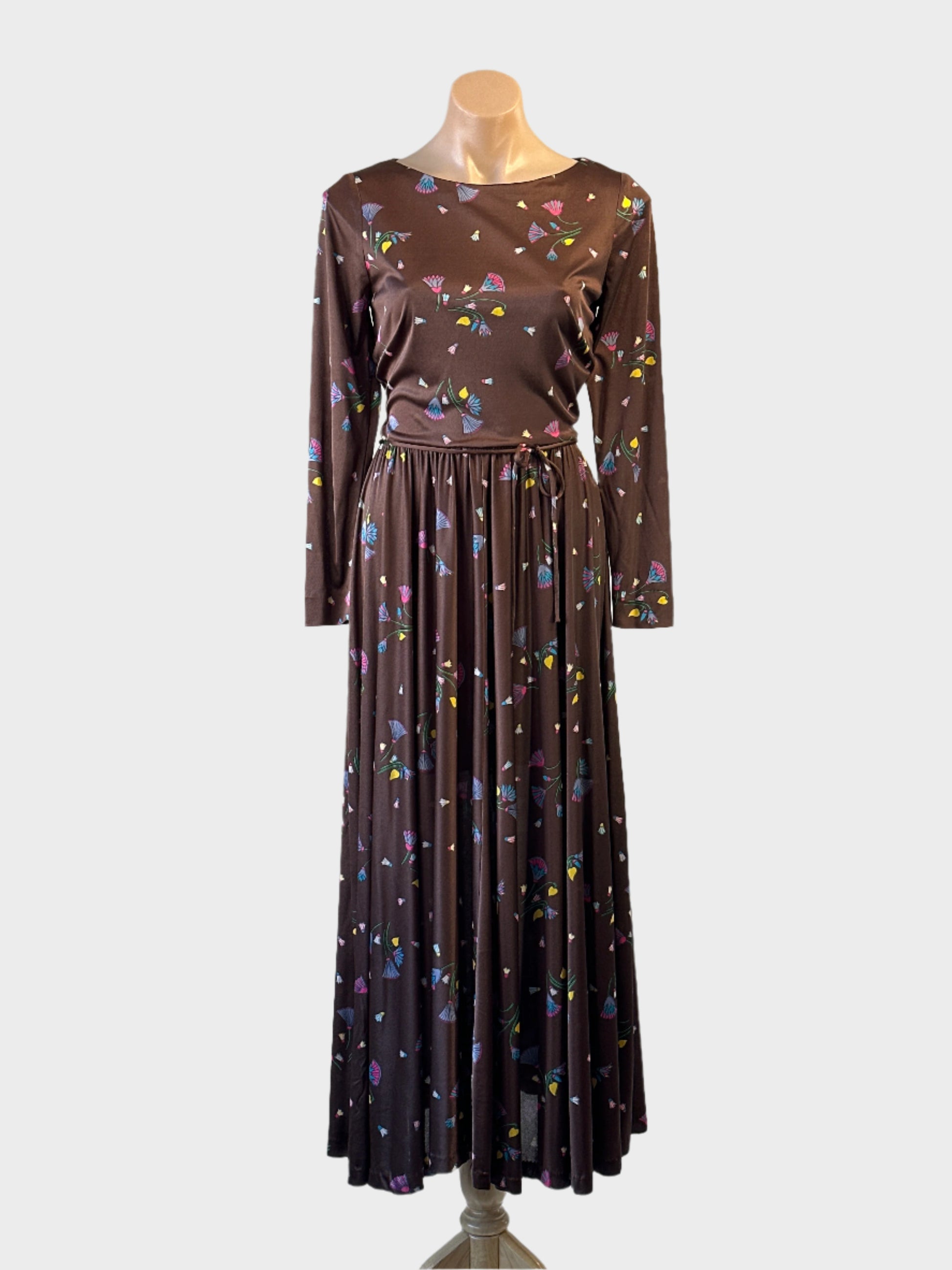 Tullo rare vintage 70s chocolate floral maxi dress with round neck, long sleeves and gathered A-line skirt — smart casual wear.