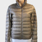 Uniqlo beige puffer jacket with zip front and band collar for casual wear.