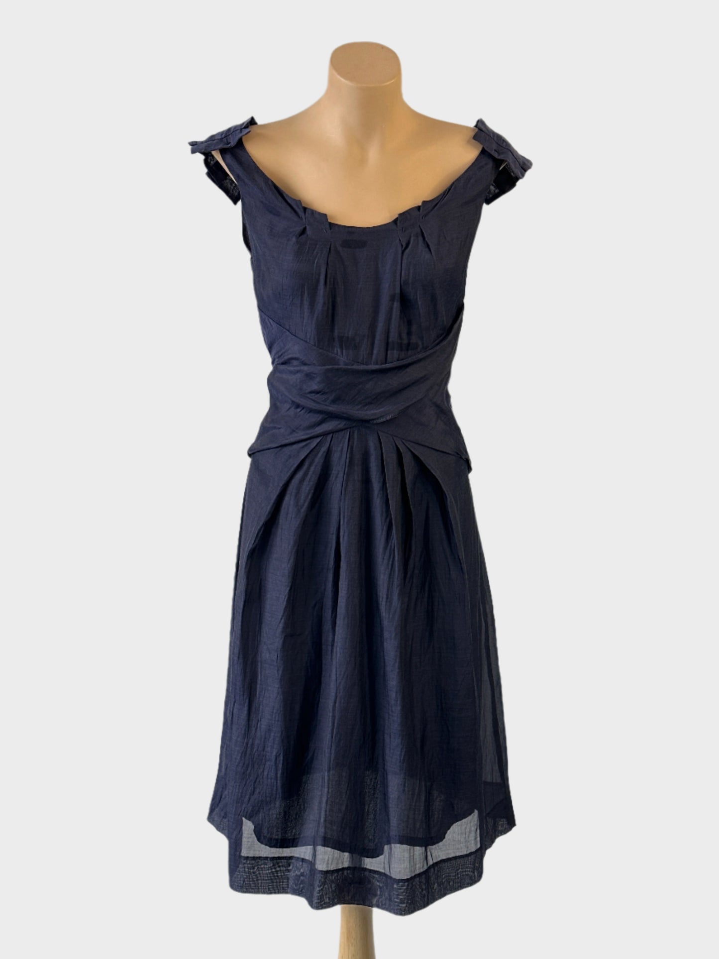 Veronika MaineA-line dress in blue crinkle weave with pleated v-neck, pleated epaulettes and midriff yoke for office wear.