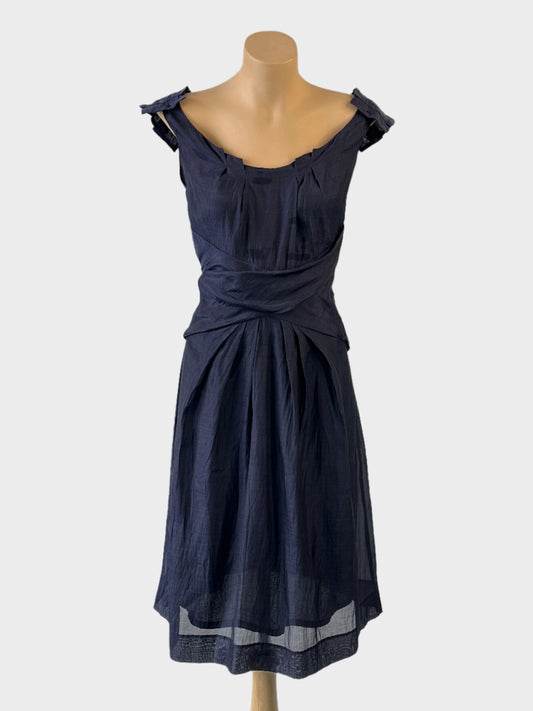 Veronika MaineA-line dress in blue crinkle weave with pleated v-neck, pleated epaulettes and midriff yoke for office wear.