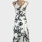 Veronika Maine black and white A-line dress in linen with floral print, surplice neck, and full skirt for smart casual or office wear.