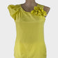 Veronika Maine yellow asymmetric top in silk cotton with polished finish, round neck with rosette and pleated cap sleeve for office wear or smart casual.