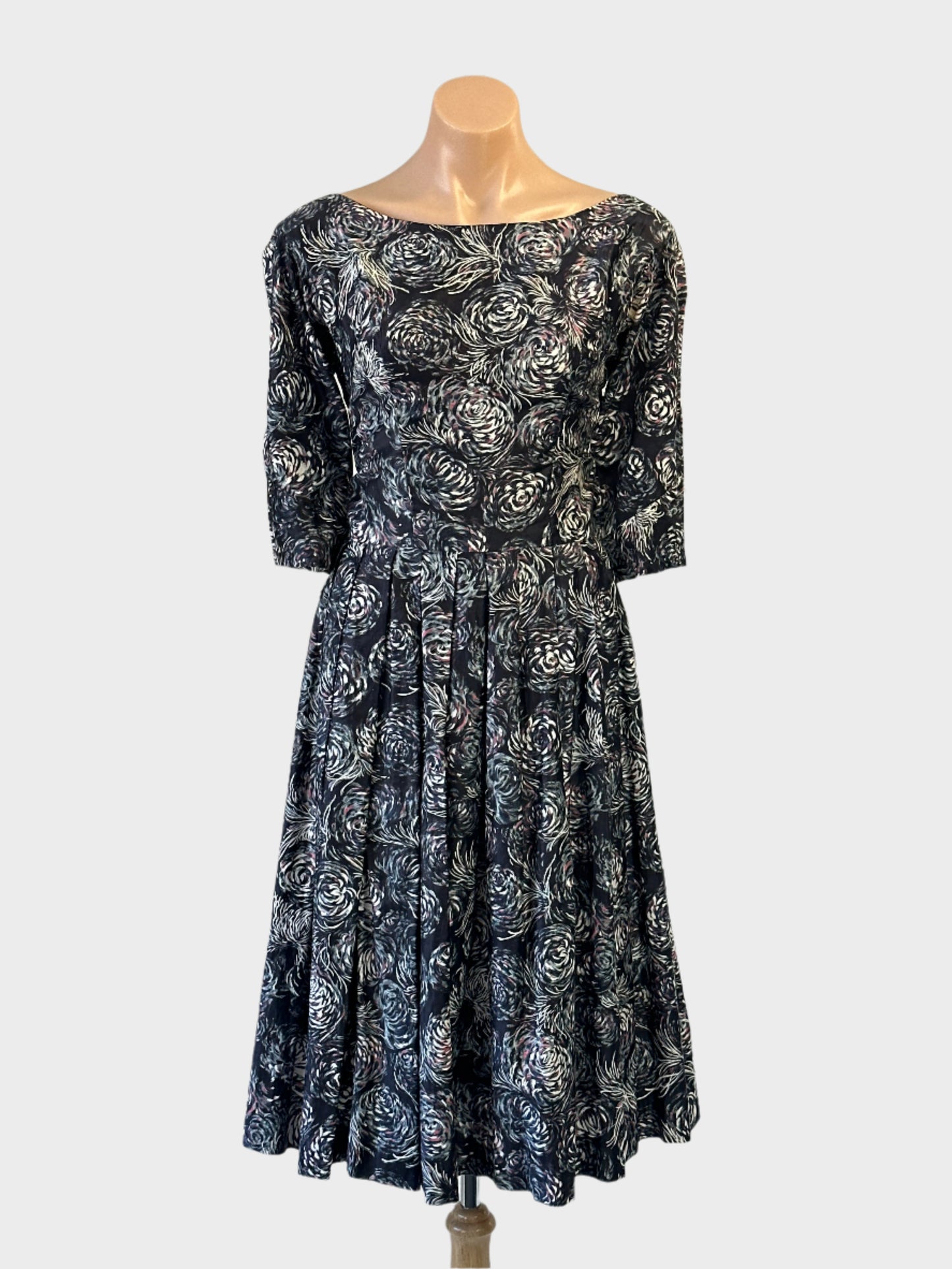 Vintage 60's A-line dress in navy blue and grey with abstract floral print for office or smart casual wear.