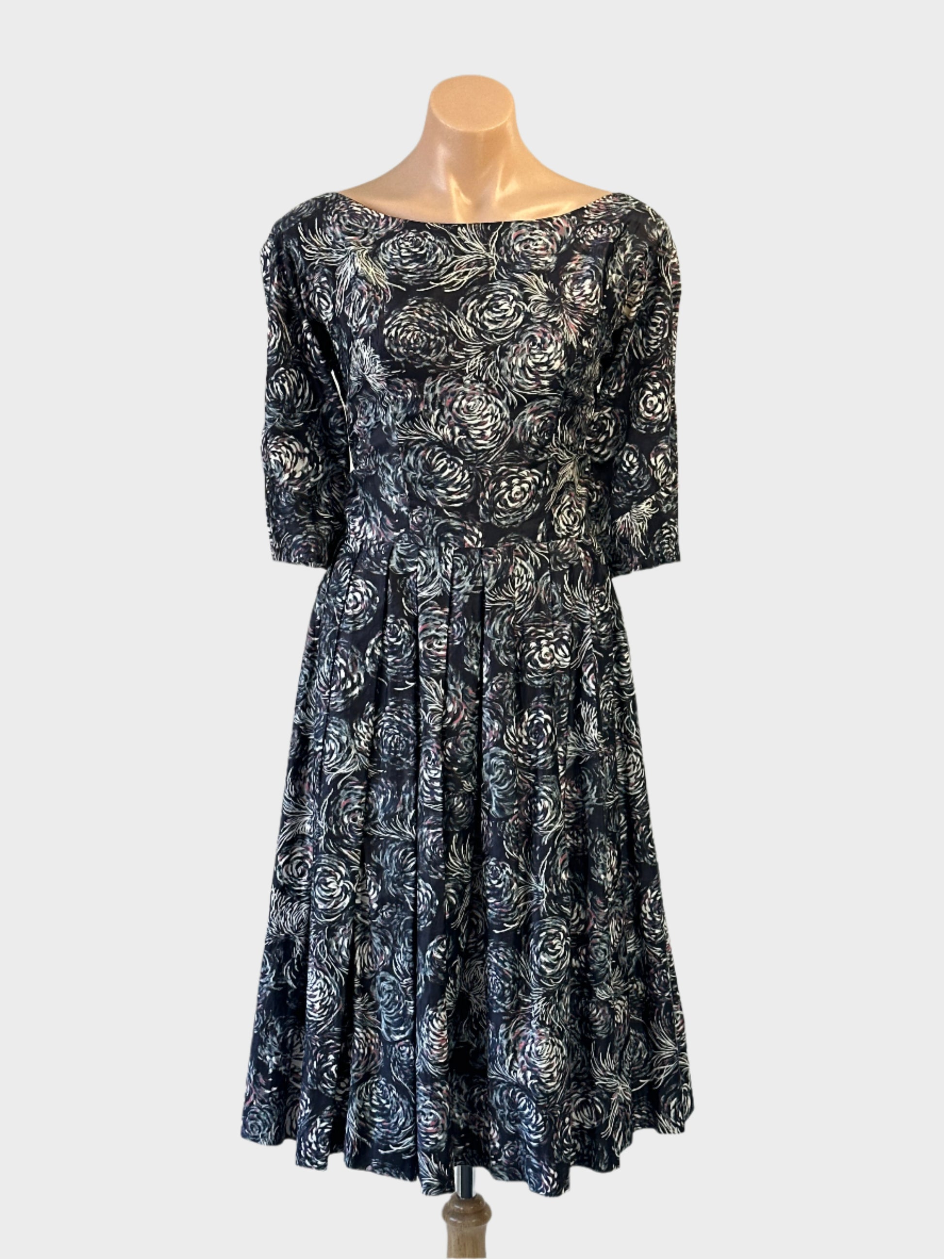 Vintage 60's A-line dress in navy blue and grey with abstract floral print for office or smart casual wear.