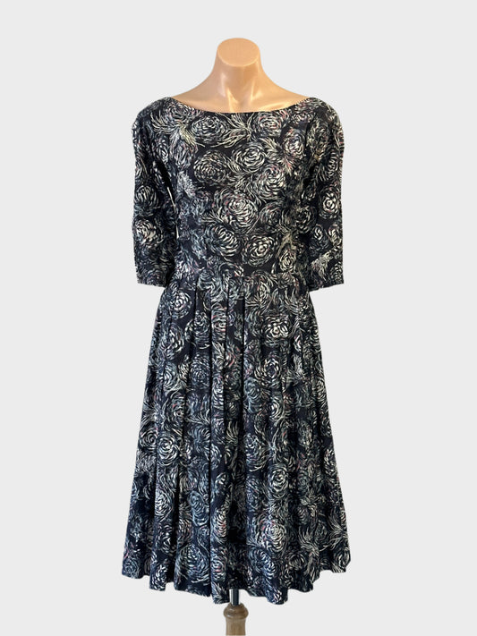 Vintage 60's A-line dress in navy blue and grey with abstract floral print for office or smart casual wear.