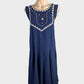 Vintage designer Prue Acton navy blue vintage 70's trapeze dress in cotton with embroidered bib and godet skirt for smart casual or special events.