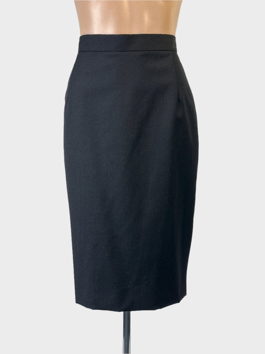 Designer Vivienne Westwood black wool skirt with dart shaping and signature flared back panel detail for smart casual or business wear.