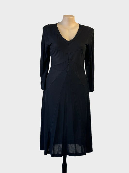 Vintage Von Troska dress in black jersey with paneled bodice and v-neck for evening wear.