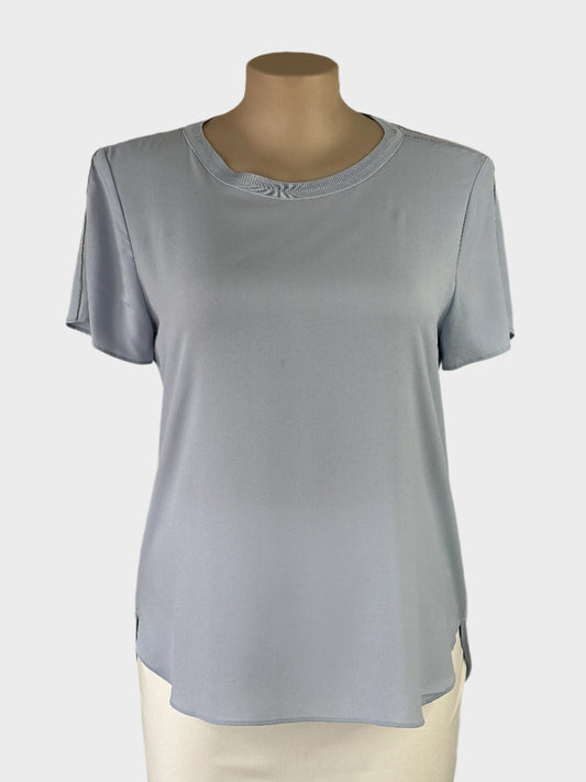 Witchery blue sleeveless top with rib trim, sheer crepe epaulettes, beaded trim, jersey back and shirt tail hem for office or smart casual wear.