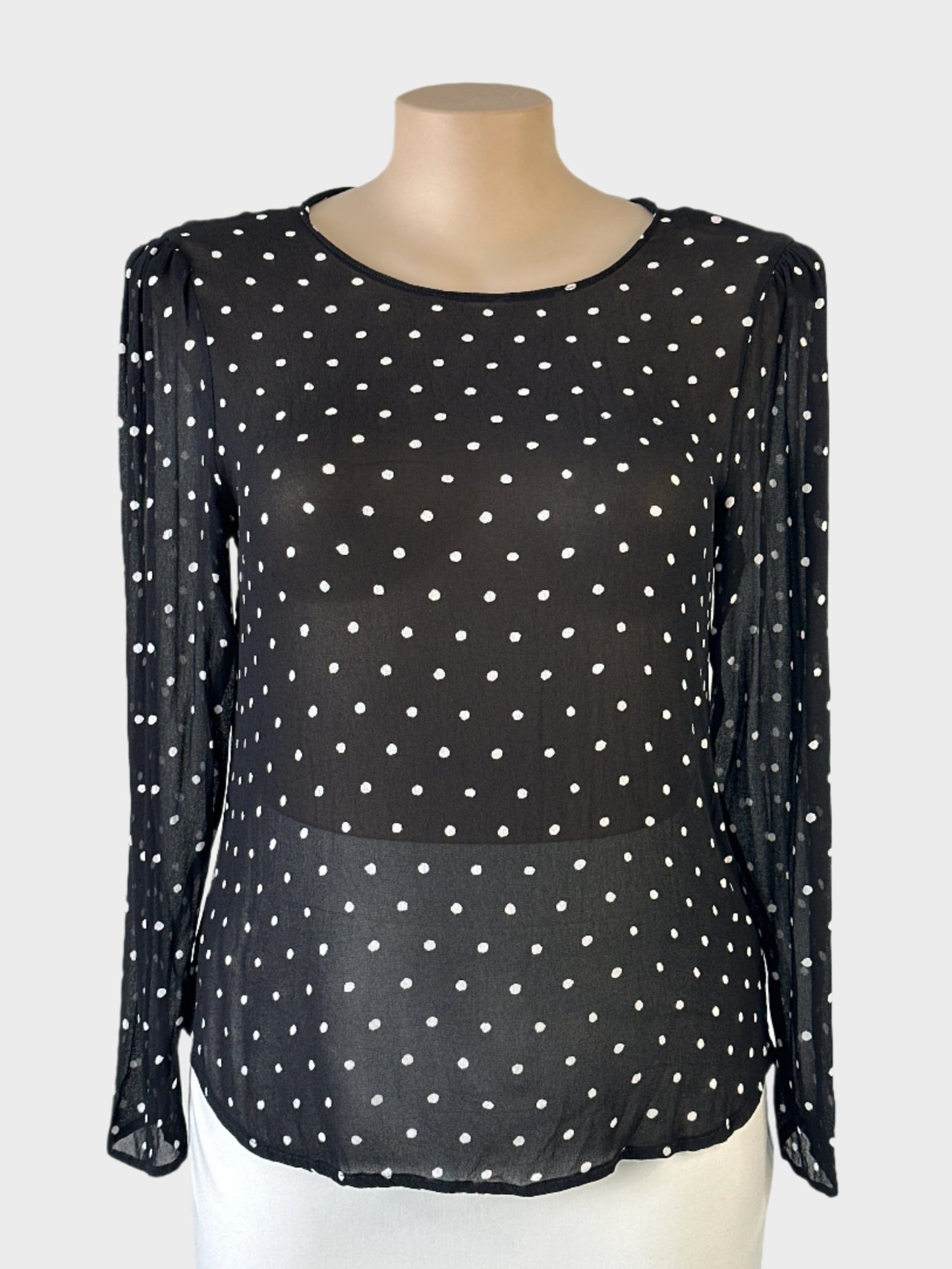 Witchery top in black & white sheer crepe with polka dot print, round neck and keyhole back for office wear.