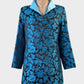 Xiyanghuafu black and blue satin brocade mandarin jacket with frog buttons for special events or evening wear.
