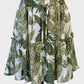 Yours Truly tropical style tiered skirt in green and white botanical print with drawstring waistband for resort or smart casual wear.