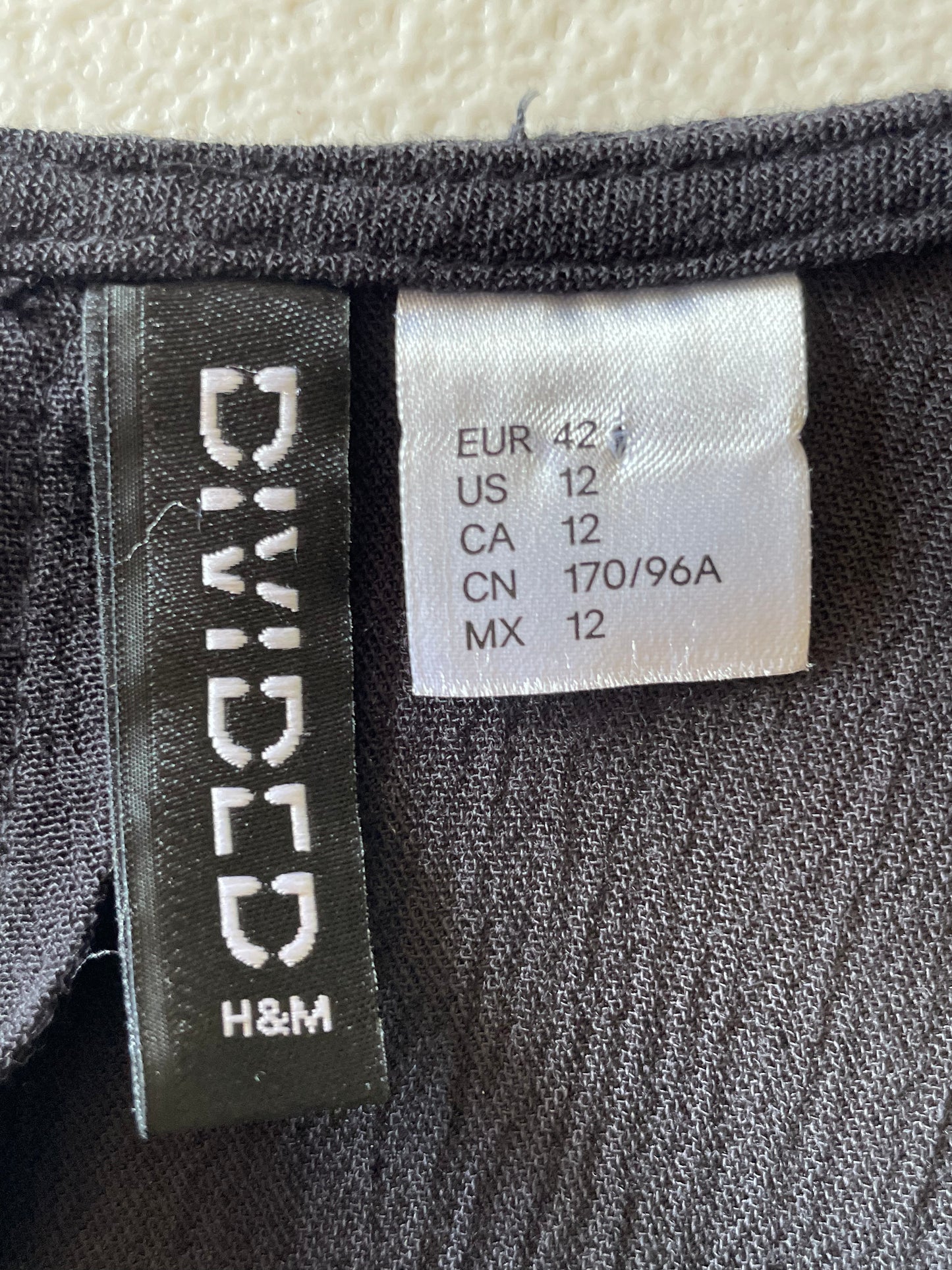 H&m shop top divided